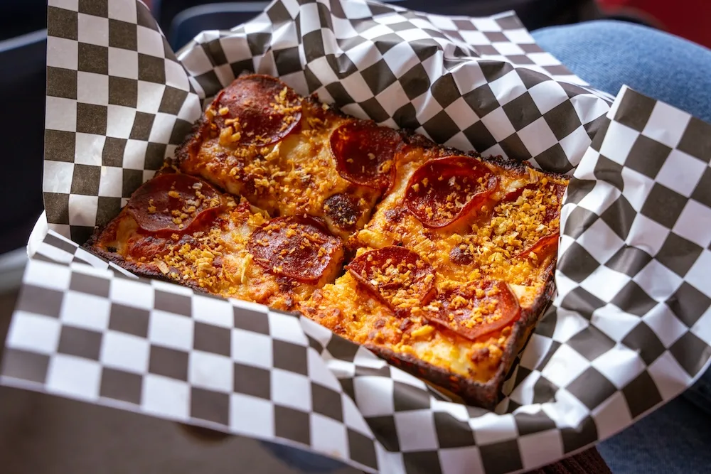 A slice of pepperoni pizza from Motor Town Pizza at Energizer Park.