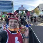 Scott MacArthur celebrates completing the Arizona Half Marathon.