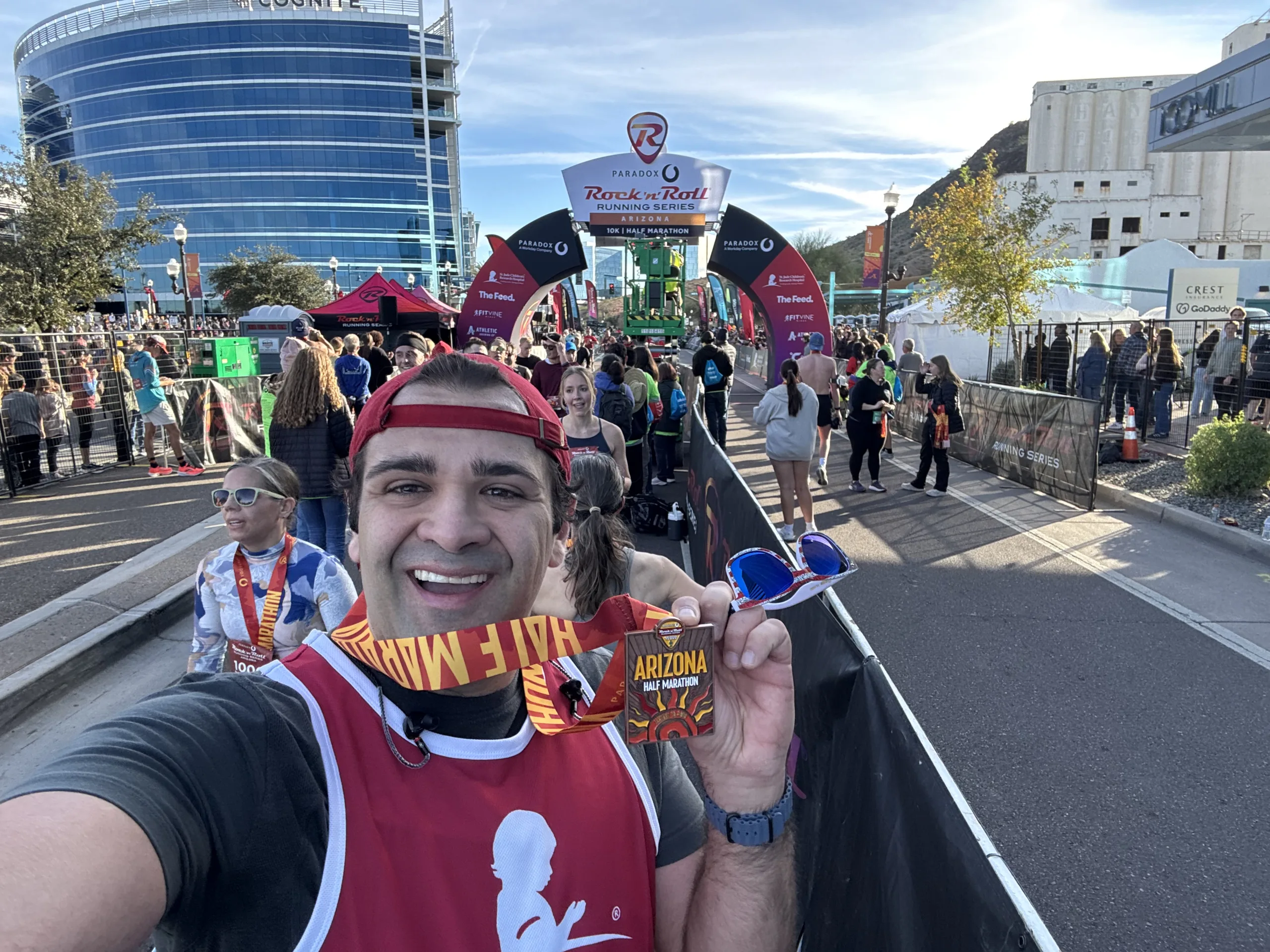 Scott MacArthur celebrates completing the Arizona Half Marathon.