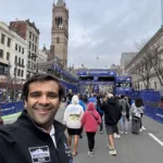 Scott MacArthur celebrates completing the 2026 Boston Marathon.