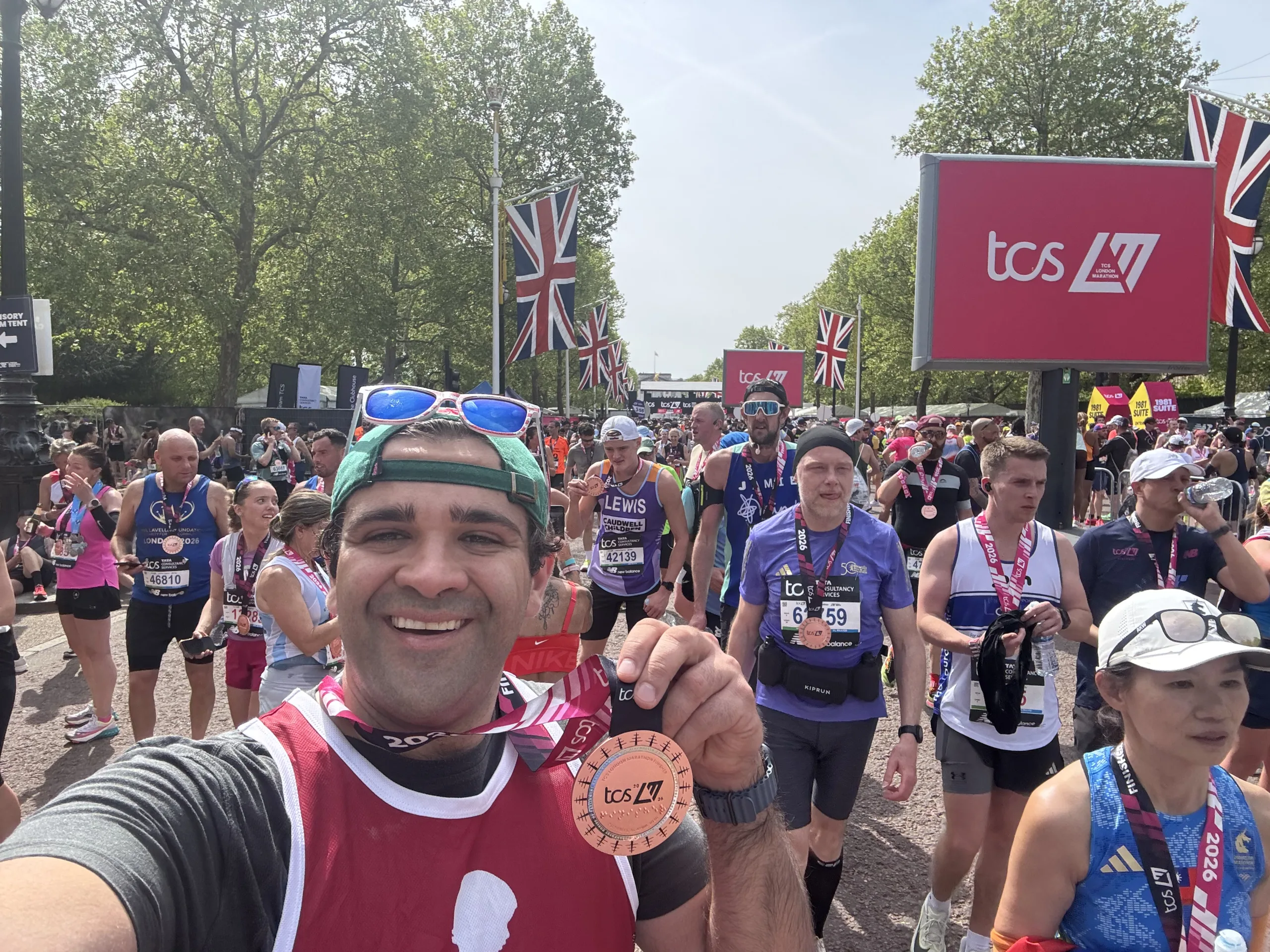 Scott MacArthur celebrates completing the 2026 TCS London Marathon.