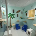 This tropical-inspired suite brings vacation vibes with climbing shelves and playful décor designed for curious cats.