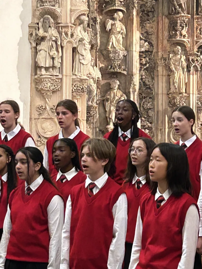 St. Louis Children's Choirs singers performing in Igreja de Santa Cruz, founded in 1131.