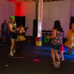 Parents and kids dancing around