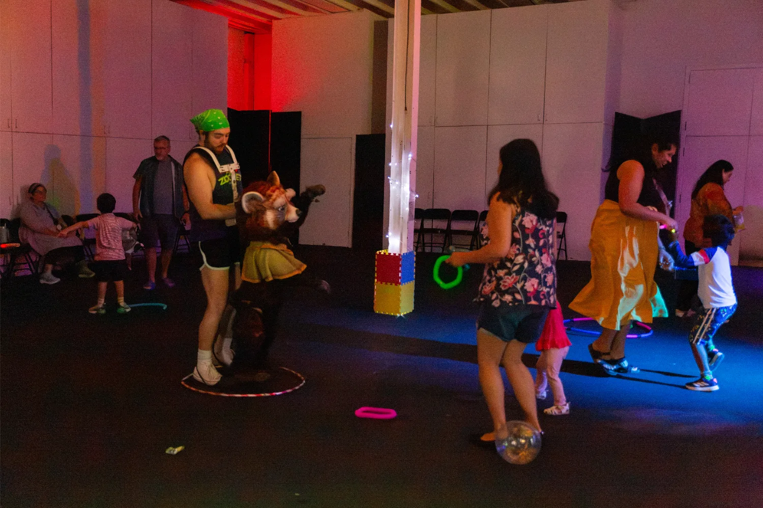 Parents and kids dancing around