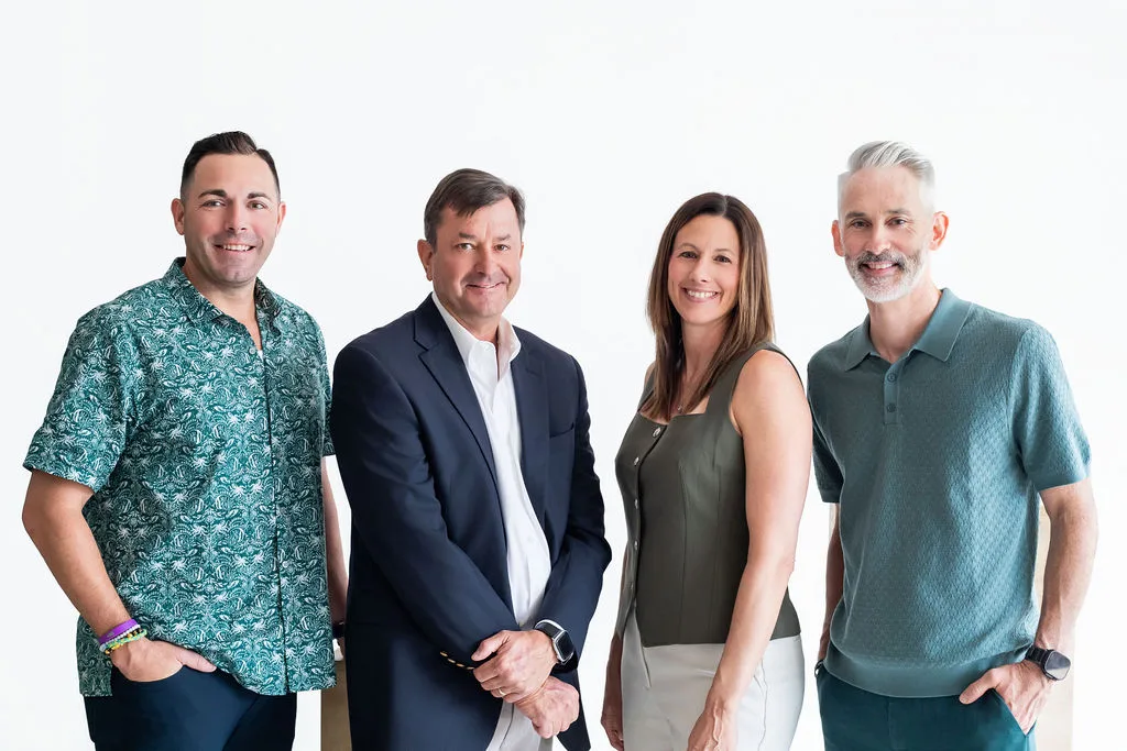 From left: Chase Crump, CFP®, Partner & Financial Guide and NFLPA Registered Player Financial Advisor; Steve Carney, ChFC®, Partner & Wealth Advisor; Chris Wedell, CFP®, CDFA®, Partner & Wealth Advisor, and StrongHer Money Ambassador; and Dany Martin, MBA, Partner & Wealth Advisor