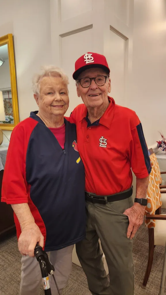 Kinwell residents show their St. Louis Cardinals spirit and celebrate Opening Day in red.