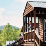 Guests can enjoy peaceful mornings on the porch of their cabin, surrounded by the beauty of the Ozarks.