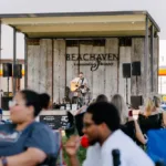 Guests enjoy live music at Beachaven Vineyards & Winery.