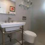 By hiding the tank within the wall, an in-wall toilet can save several inches of space—an especially useful solution in smaller bathrooms and powder rooms.