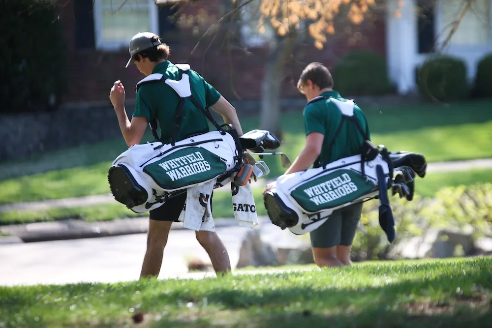 Whitfield golfers head out with their clubs during the season.