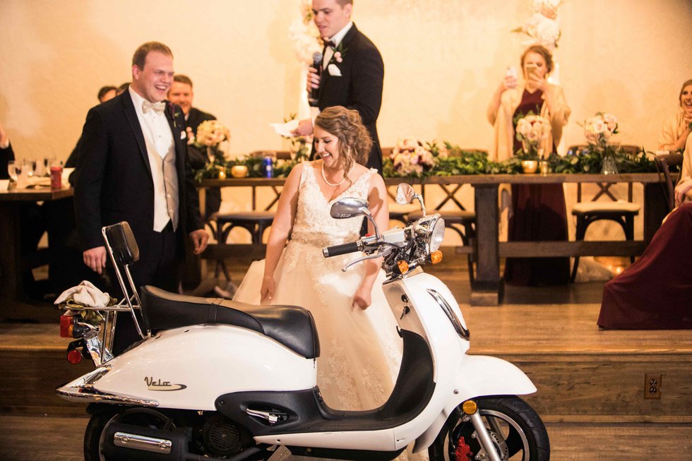 This bride now rides in style after receiving a scooter on her wedding day