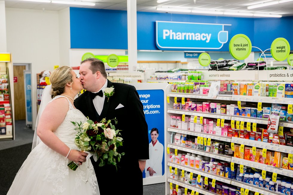 These newlyweds took wedding photos at a CVS in the Central West End