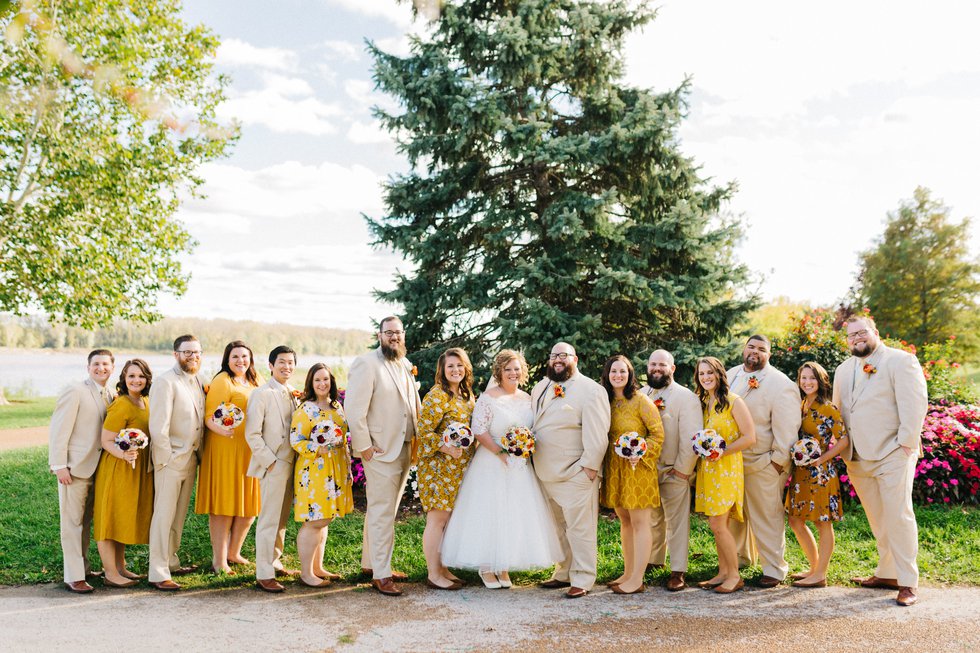 This fall wedding in St. Charles featured riverfront photos and a squirrel cake