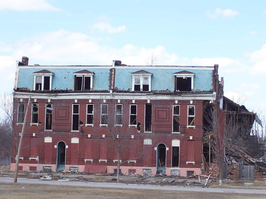 A row of dilapidated homes.