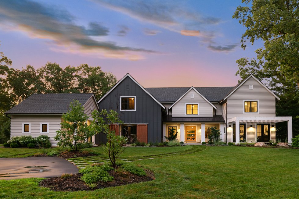 Farmhouse charm meets sleek design in this Frontenac custom build