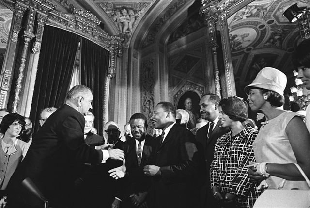 640px-Lyndon_Johnson_and_Martin_Luther_King_Jr._-_Voting_Rights_Act.jpg